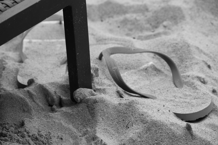 Even flip flops want frolic in the sand